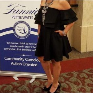 Black dress with off shoulder sleeves